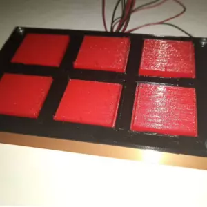 Image of the Hardware Controller, 3d Printed Red Buttons with soft texture in printed abs enclosure